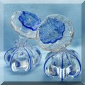 G14. Glass perfume bottles with flower stoppers. 